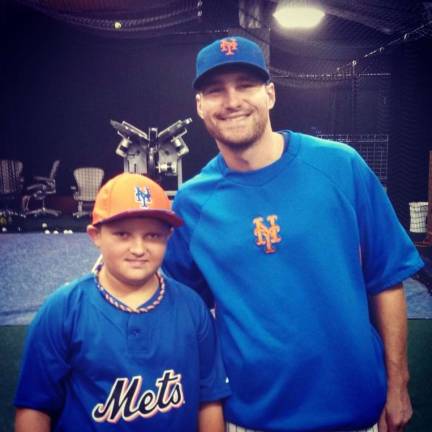 Florida youth takes batting practice with the Mets Daniel Weslowski, 10, at Citi Field with Mets infielder Daniel Murphy.