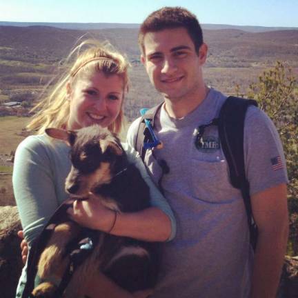 Love is in the air Alison Hainzl of Warwick, N.Y. "Tony, Alison and their adopted mutt Ranger pose for a family photo atop the Appalachian trail in nearby Vernon, N.J."