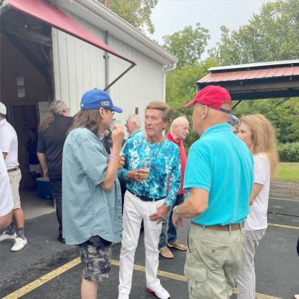 Jimmy Sturr, second from left, amid friends.