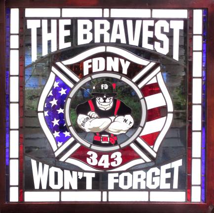 Sugar Loaf studio creates stained-glass tribute to FDNY firefighters Sundog Stained Glass Studio in Sugar Loaf was commissioned to create this stained-glass panel for the FDNY Engine 38/Ladder 59 Firehouse in the Bronx as a tribute to the 343 firefighters who perished on Sept. 11, 2001. The firehouse is also known as the Dog House Fire Station.