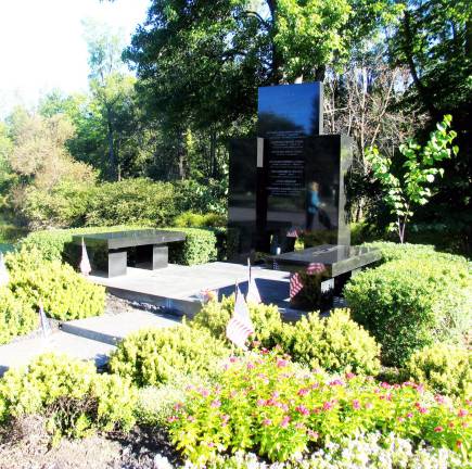 Warwick's eleventh 9-11 anniversary ceremony held in Veterans Memorial Park The names of those local residents inscribed on the Memorial are Elise Wilson, John P. Williamson, Michael Fodor, John Ginley, Stephen Harrell, Bruce Van Hine, Linda Gronlund and Peter Gyulavary.