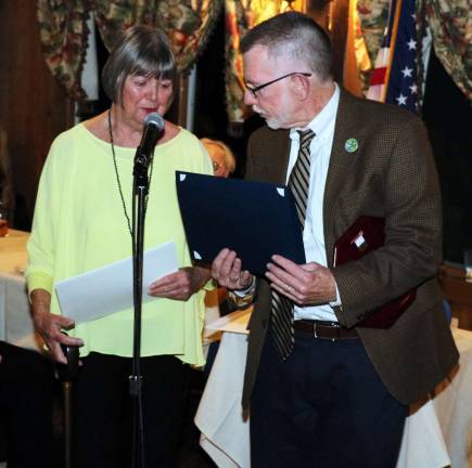 Warwick's 2018-19 Citizen of the Year Awards ceremony held at Landmark Inn Town of Warwick Supervisor Michael Sweeton presents an award for Outstanding Community Service to Marge King-Porter.