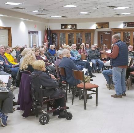 John Ruszkiewicz, president of the Drowned Lands Historical Society in Pine Island, leads he society's discussion of How the Drowned Lands were drained and became the Black Dirt Region.