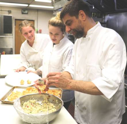 St. Stephen’s Educational Trust hosts 22nd annual cocktail party. One of the favorite attractions each year is the variety and quality of the appetizers created by Mike DiMartino, award-winning chef/owner of the Landmark Inn., and pictured here with sous chefs Catherine Clark and Keelin Bunis.
