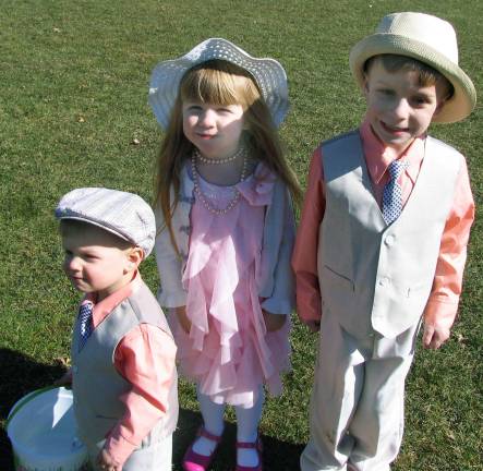 In search of the golden eggs Readyfor the 5th Avenue"Easter Parade: Sean Baird,1, his sister Kathleen, 4, and their older brother Robert, 6.