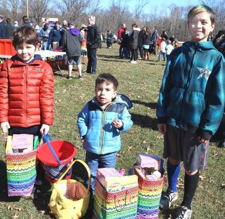 Eleventh annual Village Easter Egg Hunt held March 31 at Veterans Memorial Park The children were off and hunting, not only for the ordinary goodies, but also for three “golden eggs,” one for each age group. And each one of these entitled the lucky child to a special gift bag. The lucky winners were from left, Ulysses Michelson, 6, Jimmy Coplin, 3 and Haven Cardine, 11.