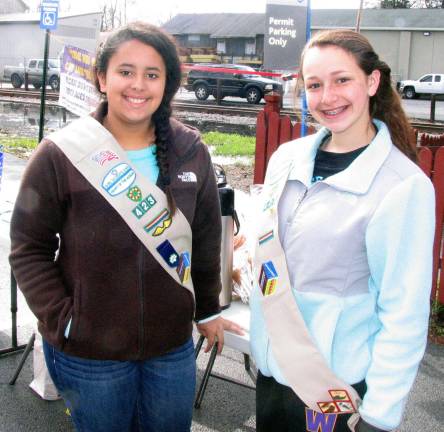 Warwick swept clean Photos by Roger Gavan From left, Troop 423 Girl Scout Julia Vargas, who coordinated volunteers and promotions, and Troop 423 Girl Scout Olivia O'Connor.