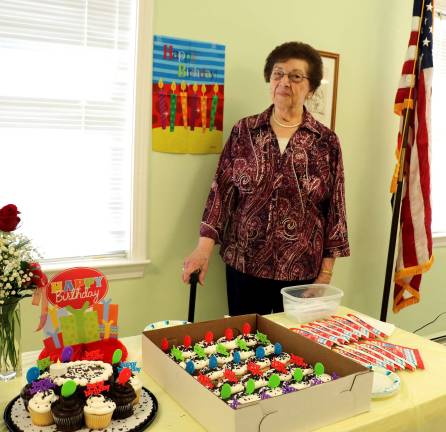 Former Warwick Town Bookkeeper Ruth Langlitz celebrates 90th birthday Photo by Roger Gavan Ruth Langlitz is about to serve cakes for her 90th birthday celebration at The Warwick Valley Seniors Club.