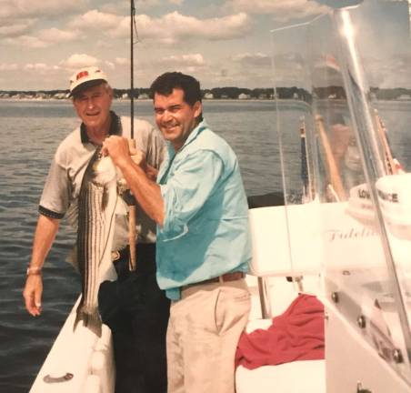 Provided photo President George H.W. Bush fishing with Warwick resident Bill Busch.