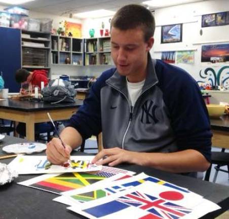 Young artists sought for human rights project Daniel M. Collins, a senior at S.S. Seward Institute in Florida, works on his painting for this year's Orange County Human Rights Commission art exhibit in art teacher Lucy Duquette's class.