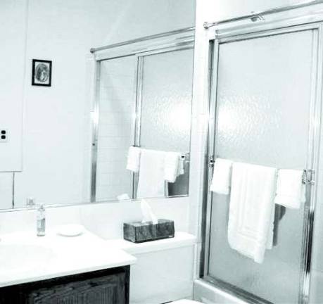 Homestead Village condominium has three bedrooms, cathedral ceiling and brick fireplace Homestead Village condominium has three bedrooms, cathedral ceiling and brick fireplace