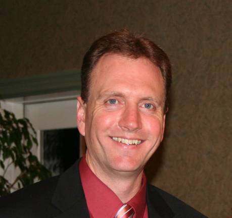 Tom Fitzgerald of Warwick joins Catholic Charities board David Jolly