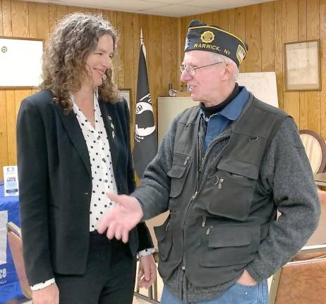 Senator Jen Metzger hosts first resource fair for veterans and active duty service members Senator Jen Metzger and Jerry Schacter, commander of American Legion Post 214, at the senator's resource fair for veterans in Warwick this week.