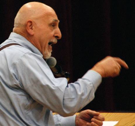 The ‘walk for choice’ Photo by Ed Bailey Resident Don Santarpia gives a passionate speech during Wednesday evening's school board meeting in Greenwood Lake.