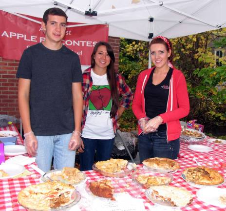 Applefest crowds exceed expectations and break records despite light rain The winning pies in the Apple Pie contest were sold by the slice with all proceeds going to the Warwick Ecumenical Council Food Pantry. Volunteers, from left, are Sam Bonder, Jerrica Lavooy and Sarah Bonder.