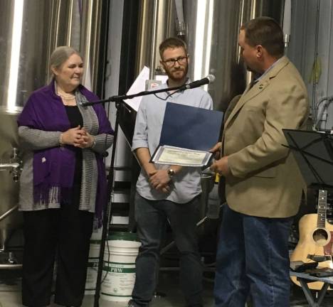 Florida Public Library Trustees: Thanks for your generous support on our 60th anniversary Provided photo County Legislator Paul Ruskiewicz presenst the Florida Public Library with a Certificate of Recognition at the Llbrary’s 60th Anniversary Fundraiser held Saturday, Sept. 29, at the Glenmere Brewing Company. Pictured from left to right are: Florida Public Library Director Madelyn Folino; William Kelemen, president of the Florida Public Library Board of Trustees; and County Legislator Paul Ruskiewicz.