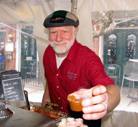 Downtown Warwick celebrates third annual Winter Blues weekend Photo by Roger Gavan John Christison, owner of Yesterdays, was on hand for a new and successful event, a Chili ìCook Off for Charityî to benefit the Warwick Ecumenical Council Food Pantry. Participating restaurants competed to see who made the best Chili while raising funds for the Food Pantry. Visitors, who donated five dollars, had an opportunity to sample Chili prepared by eight local eateries.