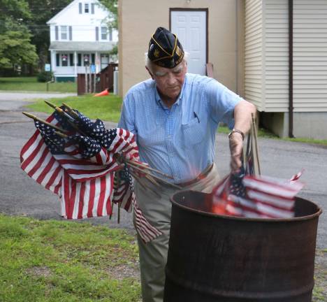 Warwick's American Legion Post 214 conducts flag disposal ceremony Robert Fletcher was one of the members of Warwick’s American Legion Post 214 performing one of its most important annual functions, a ceremonial American Flag burning behind their building on Forester Avenue.