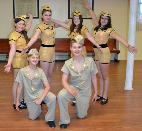 Old dance numbers and new Pictured here are tap dancers from the Joan Butler Institute of Dance. Beginning in back, from left to right, are: Katie Szynkowski, Ally Phelan, Katie Cote and Samantha Jones; and in front: Dylan Jardine and Charlie Phelan.