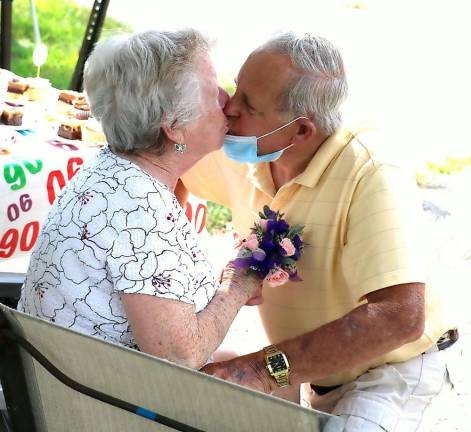 The best gift of all was a kiss from her husband of 55 years.