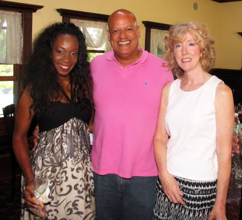 Fashion show raises $8,000 for Warwick in Bloom Photo by Roger Gavan' From left, volunteer models Donnamay Hernandez, Wayne Paterson and Laura Shanahan
