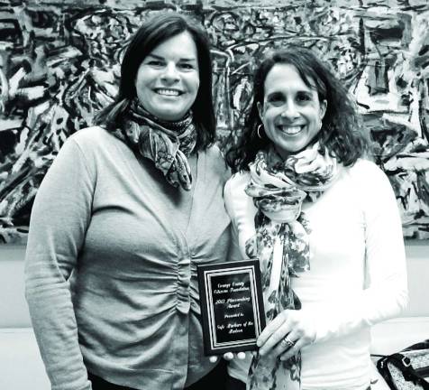 Safe Harbors receives Placemaking Award Photo by Briana Cox Lisa Silverstone, left, associate director of Safe Harbors, and Tricia Haggerty Wenz, executive director of Safe Harbors with their award from the Orange County Citizens Foundation.