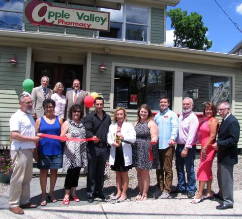 Apple Valley Pharmacy celebrates grand opening at new facility Photo by Roger Gavan On June 22, Town of Warwick Supervisor Michael Sweeton, Mayor Michael Newhard and members of the Warwick Valley Chamber of Commerce joined Doctor of Pharmacy Ann Marie Cloutier and her staff to celebrate Apple Valley Pharmacy's new location at 8 West St. in the Village of Warwick.