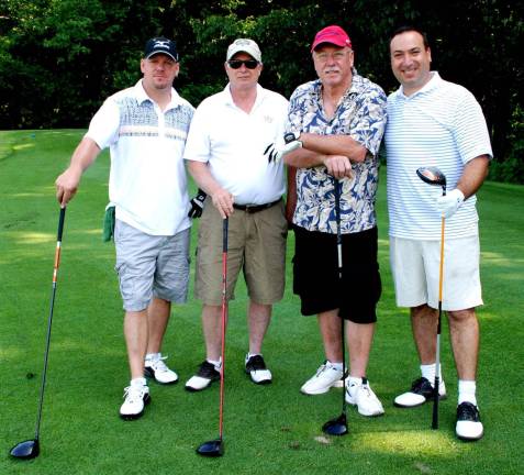 A good time was had by many Photo by Ed Bailey Pictured from left to right are golfers Tom McCloy, Nick McAteer, Bob Raif and John Sorrentino.