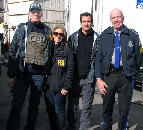 Who was that man in the black SUV? Four of the professional stunt performers, all members of the Screen Actors Guild who will appear in the episode are from the local area. From left, Jery and Jennifer Hewitt and Norm Douglass of Warwick with JeryþÄôs brother Don Hewitt who lives in Westtown.