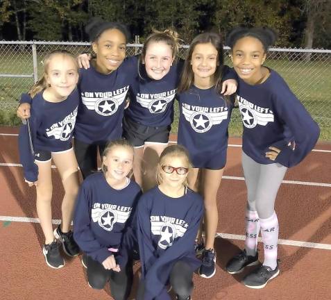 Top row: Sixth grade girls Erin Kelly, Amiya Chatman, Madelyn McSweeney, Hannah Sansone and Janiya Chatman; and in front, fifth graders Kelsy Larney and Maddie Luciano.