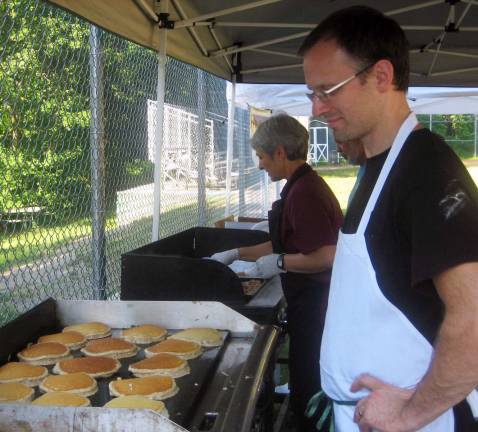 Warwick declared the state's first Appalachian Trail community Photo by Birgit Bogler Erik Johansen, executive chef and owner of the Iron Forge Inn, staffs the griddle. Hikers appreciated the delicious fuel for the morning hikes.