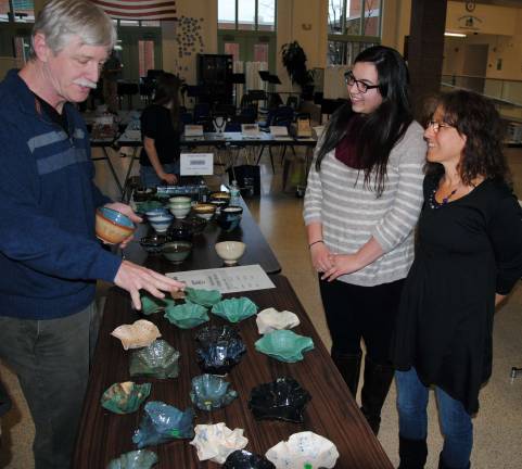 Empty Bowls project raises $35,000 An Empty Bowls guest, student potter Gianna Rotondo and local potter Dr. Deb Bernstein discuss the bowls Gianna made and donated to the event.