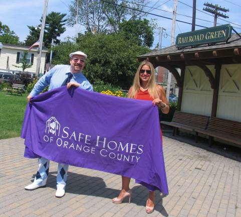 Oh yes, it's ladies' night Photo by Roger Gavan Event Chair Tim Mullally with Kellyann Kostyal-Larrier, executive director of Safe Homes of Orange County.