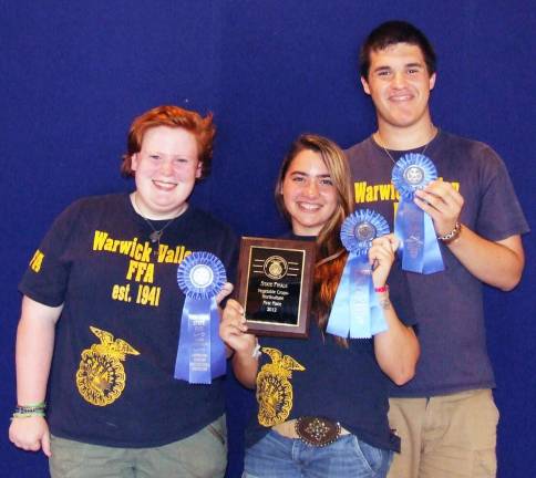 Warwick Valley FFA to compete for national title Photo by Nancy Colgan Warwick Valley FFA's first-place blue ribbon winners: From left, Erin Langdale, Taylor Mosher and Dylan Cosgrove.