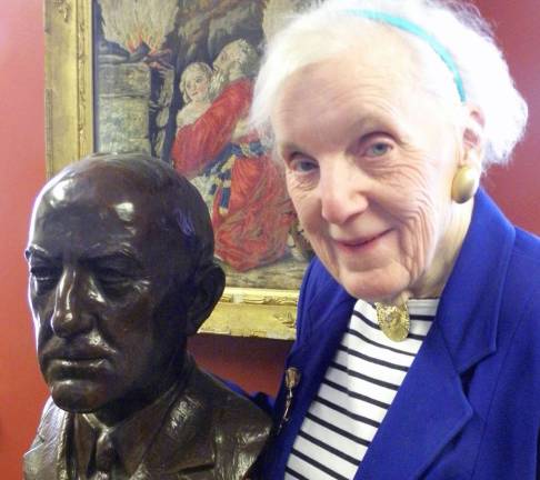 Two Warwick institutions honor another Lilibet Lewis McLean stands beside a bust of her grandfather, Edward B. Lewis, located at The A. W. Buckbee Center in the former library building that is now the headquarters of The Warwick Historical Society.