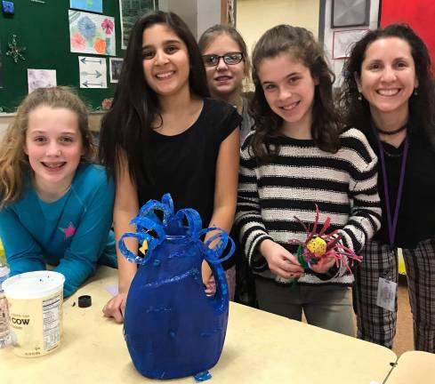 Wickham Works: 'Best wishes for a creative New Year' PROVIDED PHOTO In preparation for Earth Fest, Wickham Works volunteers facilitated workshops with members of the Change Makers club at the middle school to create “Message in a Bottle” art projects using recycled material. The students then visited classrooms at the elementary school to teach the younger kids about the importance of reusing and reducing waste.