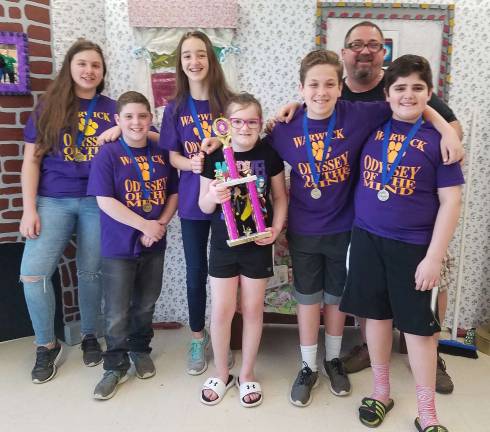 Warwick Valley Middle School Odyssey of the Mind team: From left: Sasha Blanchard, Stephen D'Ambrosio, Kayla Amato, Mary Hoey, Aiden Woods, Coach JB DiCarlantoni and Kyle Gutierrez.