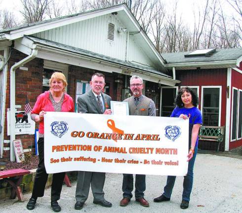 Community encouraged to support Prevention of Animal Cruelty Month Photo by Roger Gaven The Town of Warwick has proclaimed April, 2013, "Prevention of Animal Cruelty Month." From left, Celia Ross, vice president of the Warwick Valley Humane Society, Town of Warwick Supervisor Michael Sweeton, Village of Warwick Mayor Michael Newhard and Suzyn Barron, president of the Warwick Valley Humane Society.