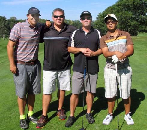 The winners of the Scramble Format, lowest score, were the men's foursome of from left, Jonathan Gaspari, Ron Charlton, Bo Kennedy and Nick Redmerski.