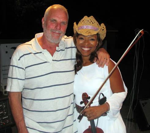 E’lissa Jones draws record crowd at Warwick Summer Concert series Photo by Roger Gavan Former Village Trustee Bill Iurato with recording artist Eílissa Jones.