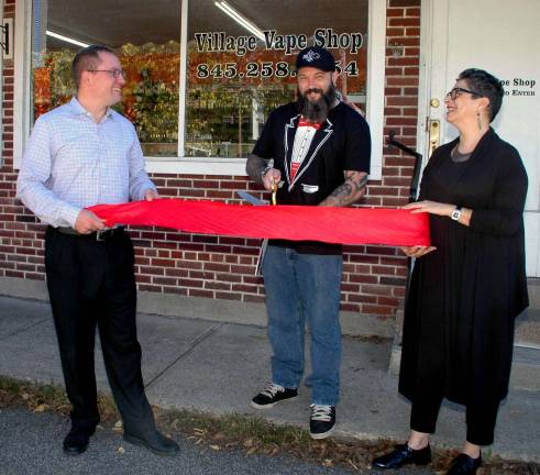 Village Vape Shop opens in Greenwood Lake Photo by Ed Bailey The Village Vape Shop in Greenwood Lake celebrated its grand opening on Oct. 4. Greenwood Lake Mayor Jesse Dwyer, left, and Secretary of GWL Chamber of Commerce Maria Stasolla, secretary of the GWL Chamber of Commerce, hold the ribbon for owner George Berger.