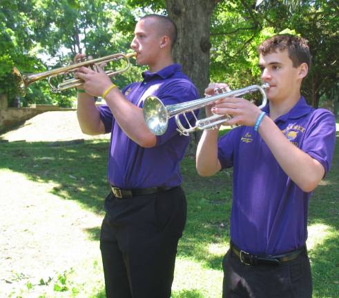 Warwick honors its veterans Photo by Roger Gavan Nate Sander and Ben Bisaro play "Taps."