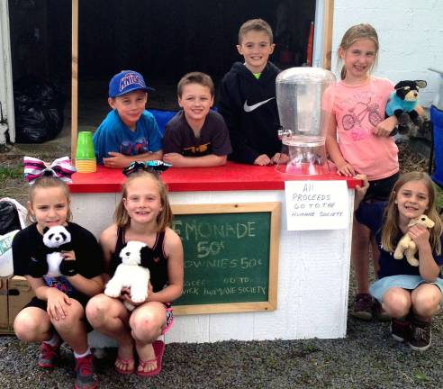 Children raise $104.10 for Humane Society Children raise $104.10 for Humane Society