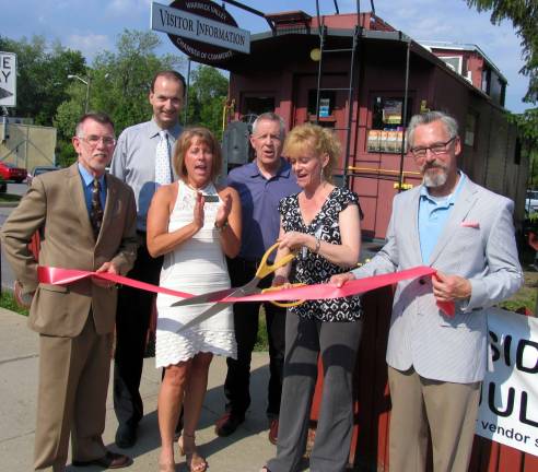 Kate Case celebrates the grand opening of her Arbonne Products From left, Town of Warwick Supervisor Michael Sweeton, Paul Rafanello, president of the Warwick Valley Chamber of Commerce, Vice President Mechelle Casciotta, Executive Director Michael Johndrow, Kate Case and Mayor Michael Newhard celebrated the opening of Case's new business selling Arbonne products.