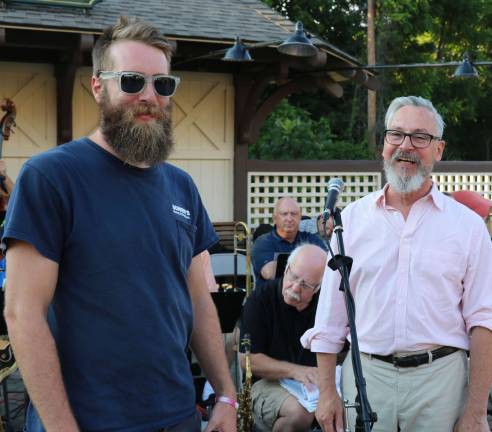 Sesquicentennial festivities feature mustache and beard contest Mayor Michael Newhard, right, introduces the overall winner, Andrew Devlin.