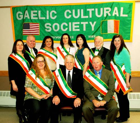 Singer Maire McVicker receives the 2013 Emerald Award Photo by Ed Bailey Group photo of the 2013 Greenwood Lake Gaelic Cultural Society, with the group's new president, Denis Mulcahy, front and center.