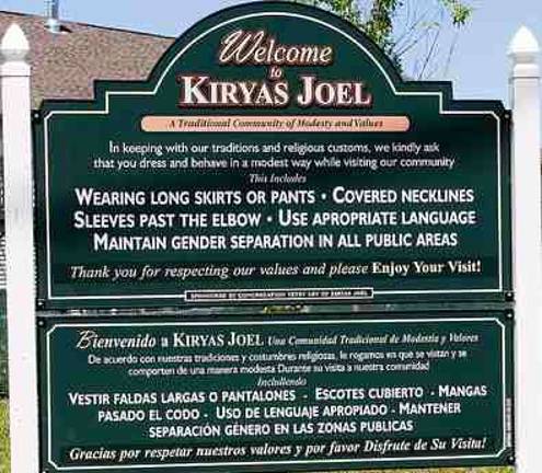 ‘Uneasy Neighbors’ The welcome sign to the Village of Kiryas Joel.
