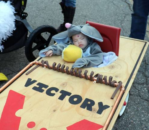 Annual Lions Club and Village of Warwick Halloween Parade draws 1,200 witches, goblins and other assorted characters Riley Mosher, 5 months, won the most original award but found the whole event boring.