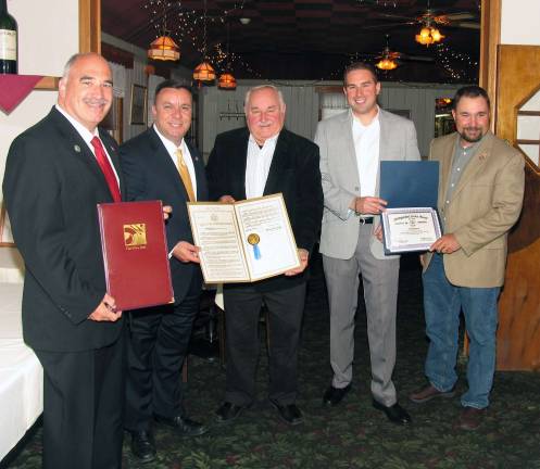 Warwick's Crystal Inn celebrates 50 years under three generations of management Photo by Roger Gavan On May 6, Assemblyman Karl Brabenec, Orange County Legislator Paul Ruszkiewicz and Town of Warwick Deputy Supervisor James Gerstner joined second-generation owner Gus Zygmunt and his son Ryan, manager of Crystal Inn, to formally celebrate the historic restaurant's 50th anniversary. From left, Town of Warwick Deputy Supervisor James Gerstner, New York State Assemblyman Karl Brabenec, Gus and Ryan Zygmunt and Orange County Legislator Paul Ruszkiewicz.