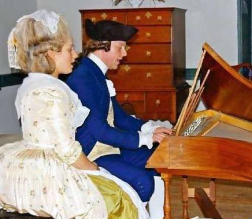 Warwick Historical Society celebrates 18th Century music, food and drink Melanie Zanakis and Erik Lichack of the Ministers of Apollo re-enactors group will sing and perform on harpsichord and violin at the Warwick Historical Society's upcoming fund raiser on Sunday, May 20.